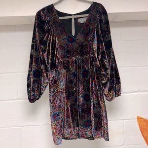 Adorable velvet babydoll dress by Anthropologie